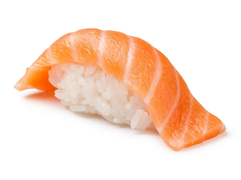 Salmon nigiri sushi with fresh salmon fillet on sushi rice at Yummy Sushi & Bento, a Japanese Restaurant in Flushing